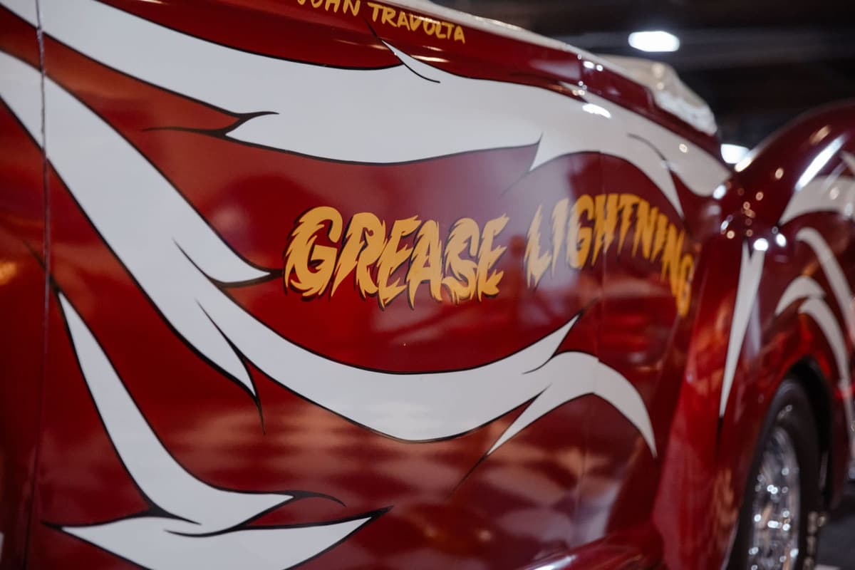 GREASE LIGHTNING — the side panel