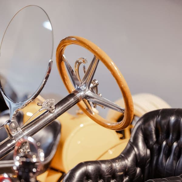 Mercer cockpit — wood wheel & black leather