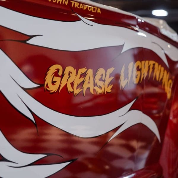 GREASE LIGHTNING — the side panel