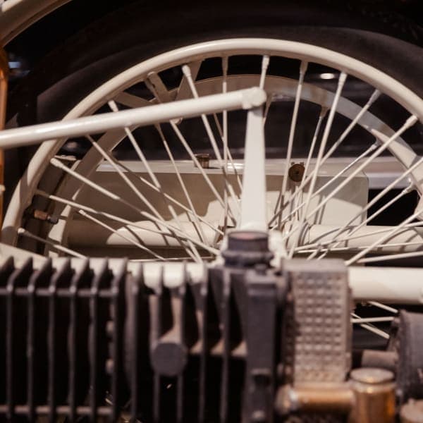 Brass-era spokes, painted white